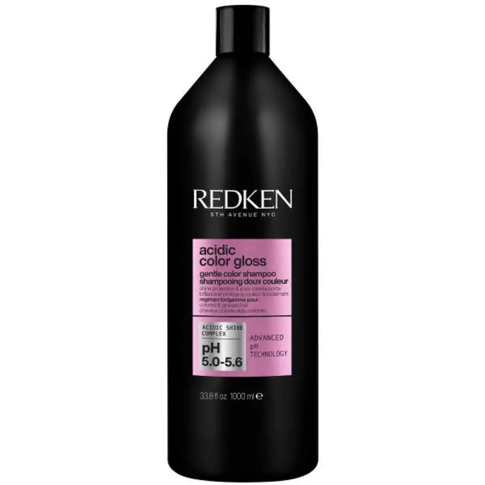 Redken acidic color gloss gentle color shampoo bottle, black with pink label