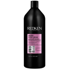 Redken acidic color gloss gentle color shampoo bottle, black with pink label