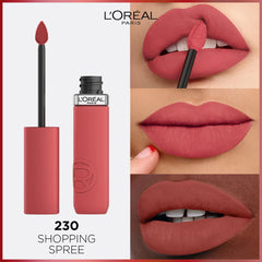 Matte liquid lipstick on lips with applicator wand, rose-red shade