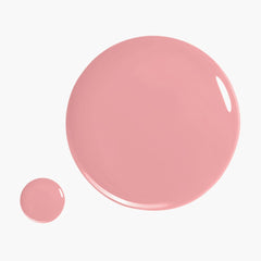 Glossy pink nail lacquer swatch circle and small dot