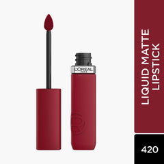 Liquid lipstick with matte applicator brush and dark red bottle, side view