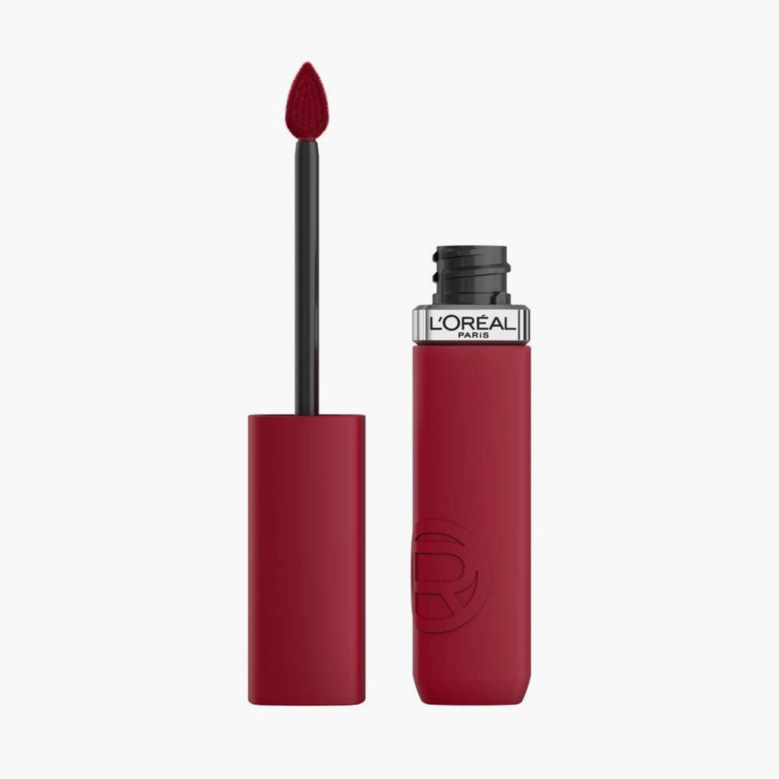 Liquid lipstick with matte applicator brush and dark red bottle, cap off