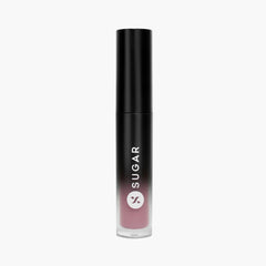 Lip cream tube with mauve-pink liquid in black squeeze bottle