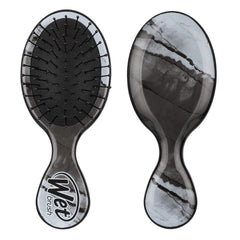 Wet Mini Detangler hair brush with black bristles on oval pad, two views