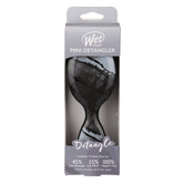 Wet Mini Detangler hair brush, black bristle head shown in retail packaging