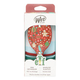 Wet mini detangler brush kit box with elf-themed brush and icons