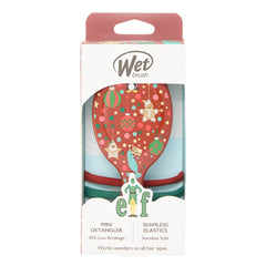 Wet mini detangler brush kit box with elf-themed brush and icons
