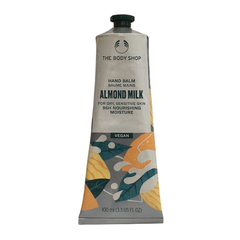 Hand balm tube in matte gray with almond milk label and black cap, 100 ml