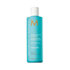 Moroccanoil Extra Volume shampoo bottle with turquoise label and silver pump cap