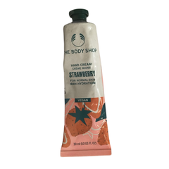The Body Shop Strawberry hand cream tube with green cap, 30 ml, beige with strawberry print