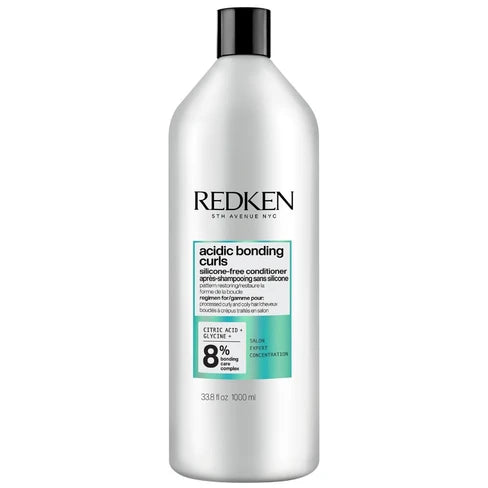 Redken acidic bonding curls conditioner bottle with black cap