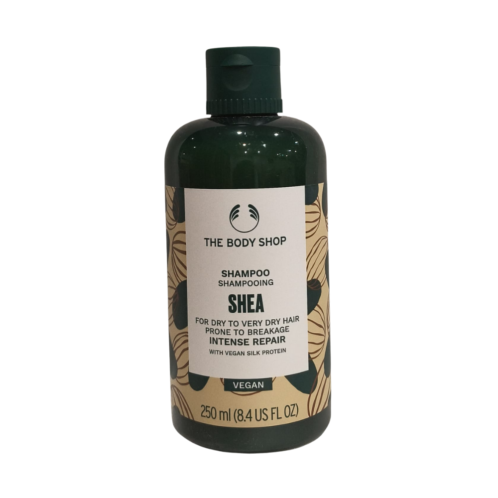 Shampoo bottle with dark green body, black cap, cream label, 250 ml