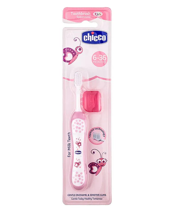 Pink kids toothbrush in retail blister pack with bee-themed graphics, soft bristles