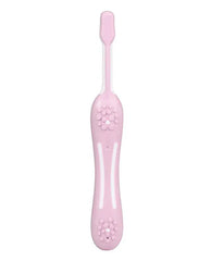 Pink toddler toothbrush with small circular bristle pads on head