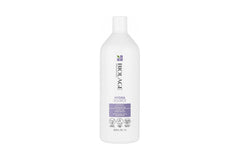Biolage Hydrasource shampoo bottle, white plastic with flip-top lid
