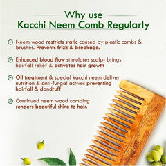 Neem wood comb with wide teeth, angled close-up