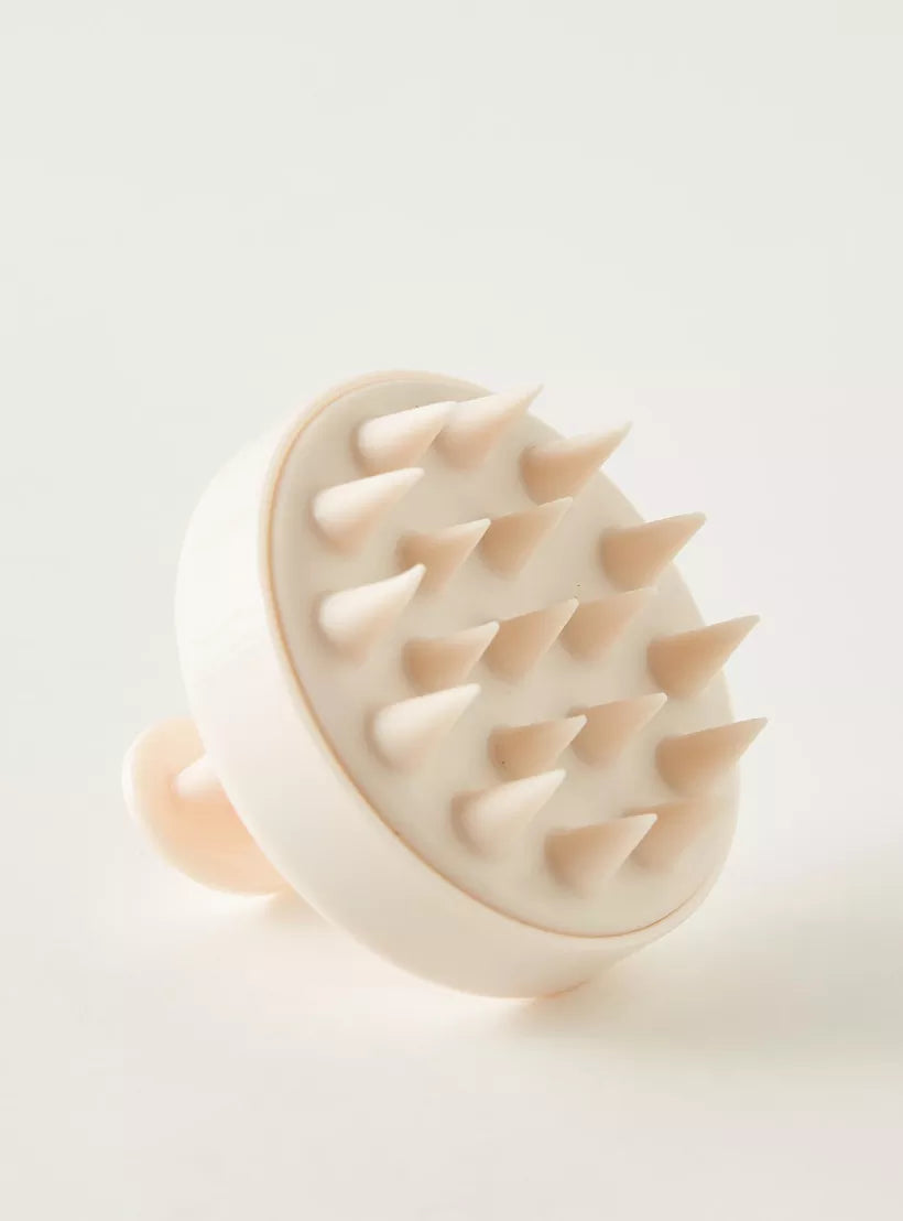 Cream scalp massage brush with silicone bristles