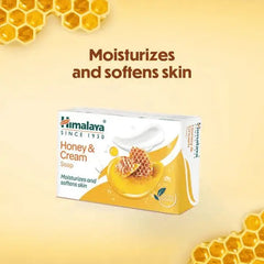Himalaya Honey & Cream soap box with honeycomb and white cream swirl illustration