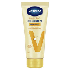 Vaseline Intensive Care deep restore body and hand lotion tube, gold and blue cap
