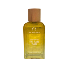 Ylang ylang eau de parfum bottle with brown wooden cap, yellow glass, 75 ml