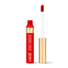 Red Lakme matte sindoor with applicator wand, in bottle and cap.