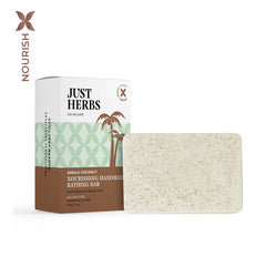 Handmade coconut bath bar with speckled off-white soap, shown with product box.