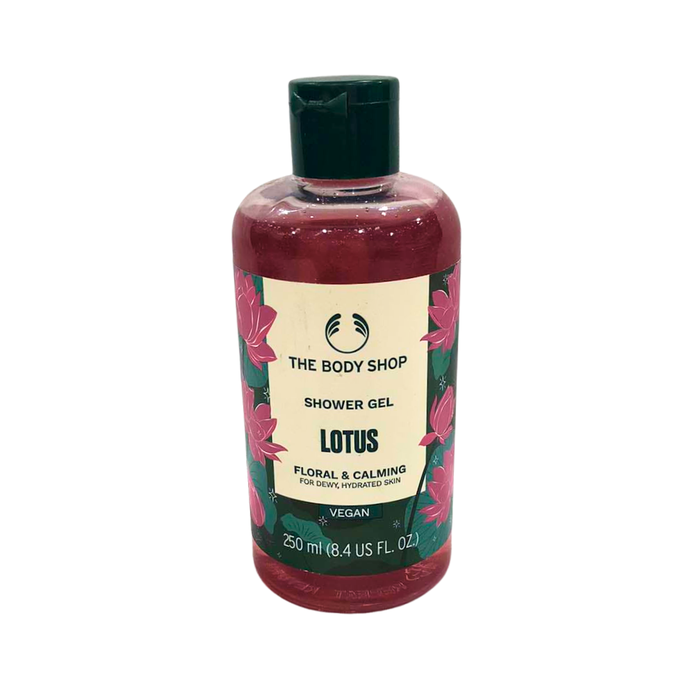 Shower gel bottle with maroon liquid, green cap, The Body Shop Lotus label