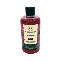 Shower gel bottle with maroon liquid, green cap, The Body Shop Lotus label