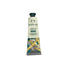 Hand balm bottle with green cap and Moringa label, 30 ml