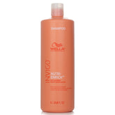 Wella Professionals Invigo Nutri Enrich shampoo bottle, 1 L, orange pump bottle