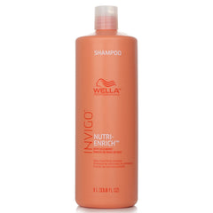 Wella Professionals Invigo Nutri Enrich shampoo bottle, 1 L, orange pump bottle