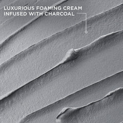 Charcoal-infused detox facewash foam texture in smooth sweeping streaks