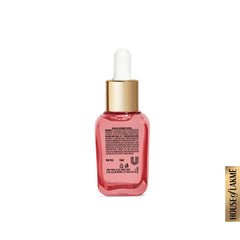 Lakme glycolic face serum bottle with white dropper, back label, red liquid
