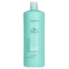 Mint green shampoo bottle with WELLA and Volume Boost label, 1L