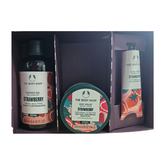 Strawberry gift pack with shower gel, body scrub, and hand cream in a box.