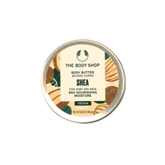Shea body butter tin lid, round cream label with green and brown graphics