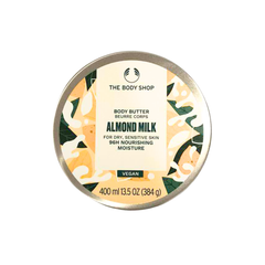 The Body Shop almond milk body butter tin, round jar with printed label