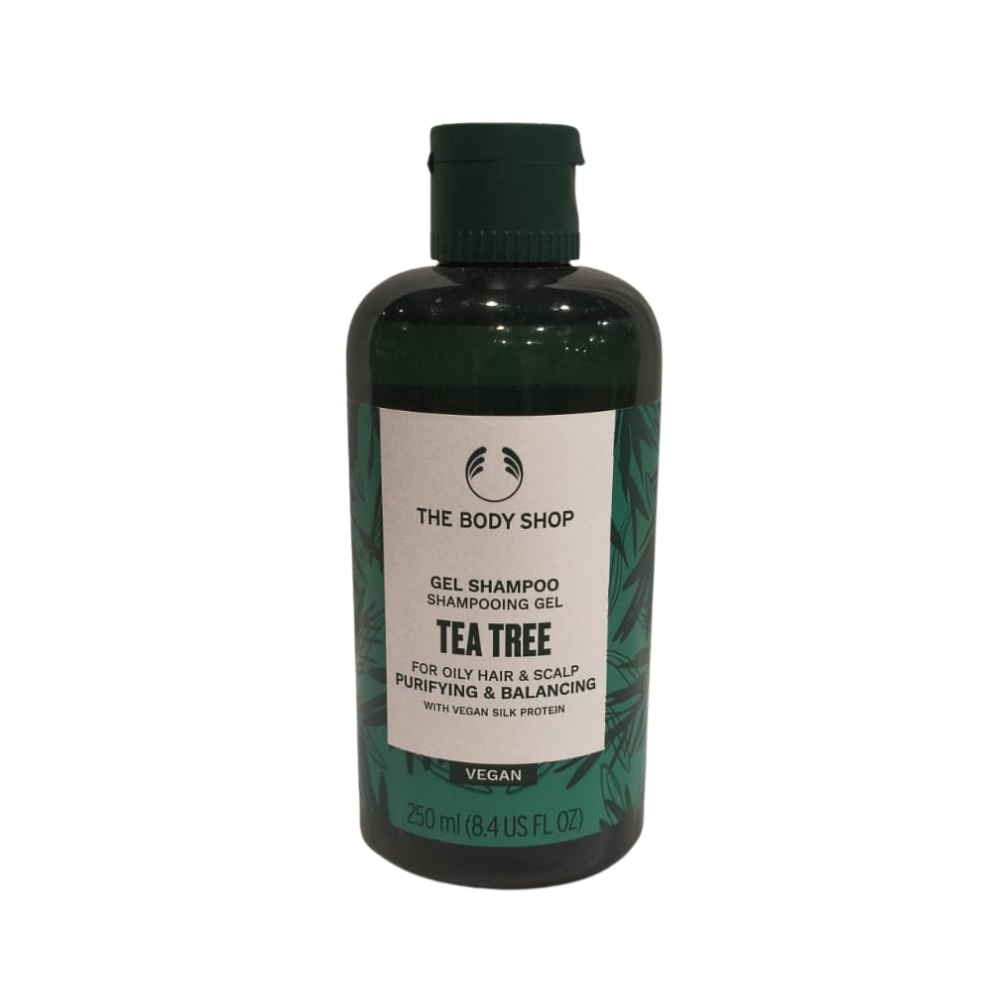 The Body Shop Tea Tree purifying shampoo bottle, dark green, 250ml
