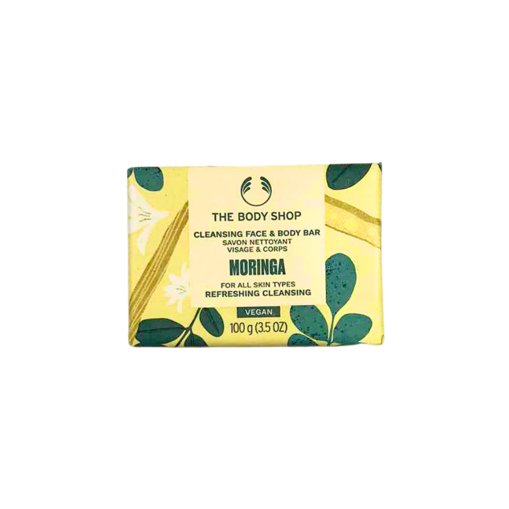 The Body Shop Moringa cleansing face and body bar, yellow and green leaf soap packaging
