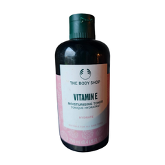 The Body Shop Vitamin E hydrating toner bottle, dark with green cap, 250 ml