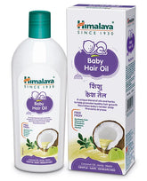 Baby hair oil bottle with green cap and white body, front label.