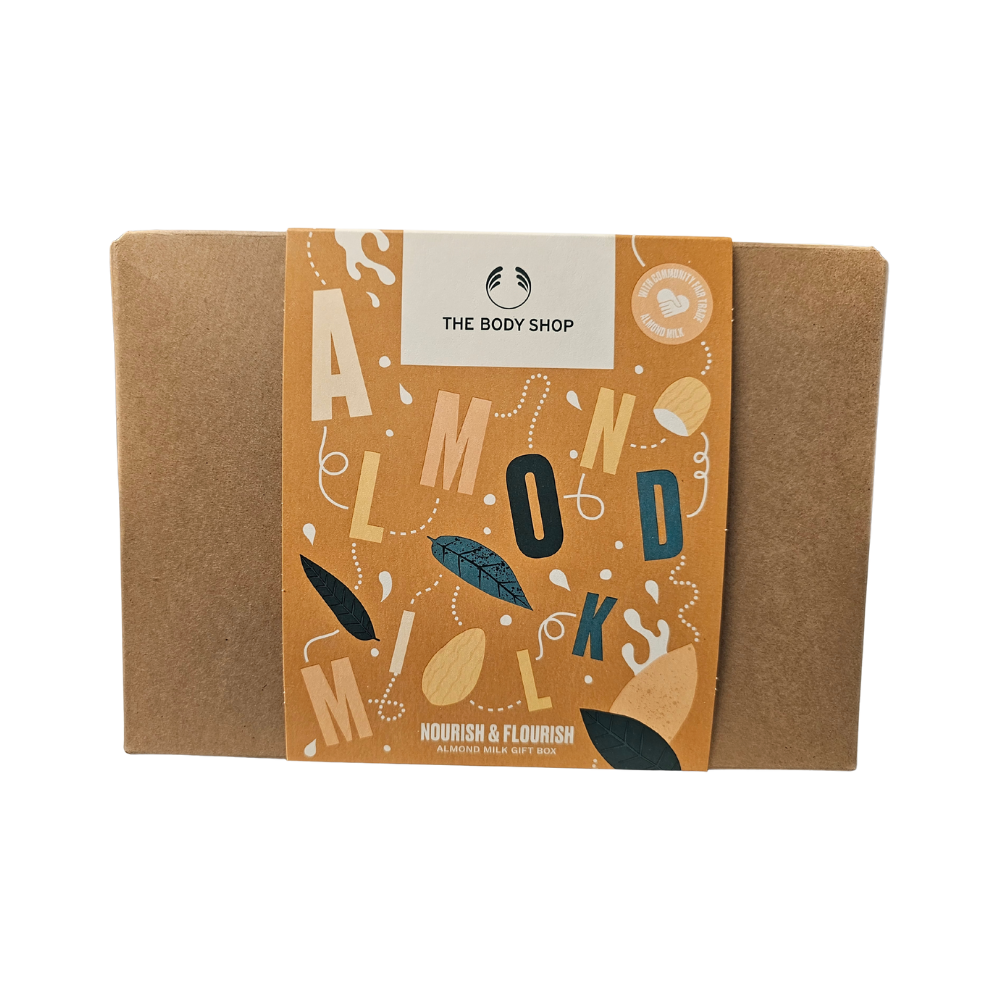 The Body Shop Almond Milk gift set box in brown kraft with illustrated label