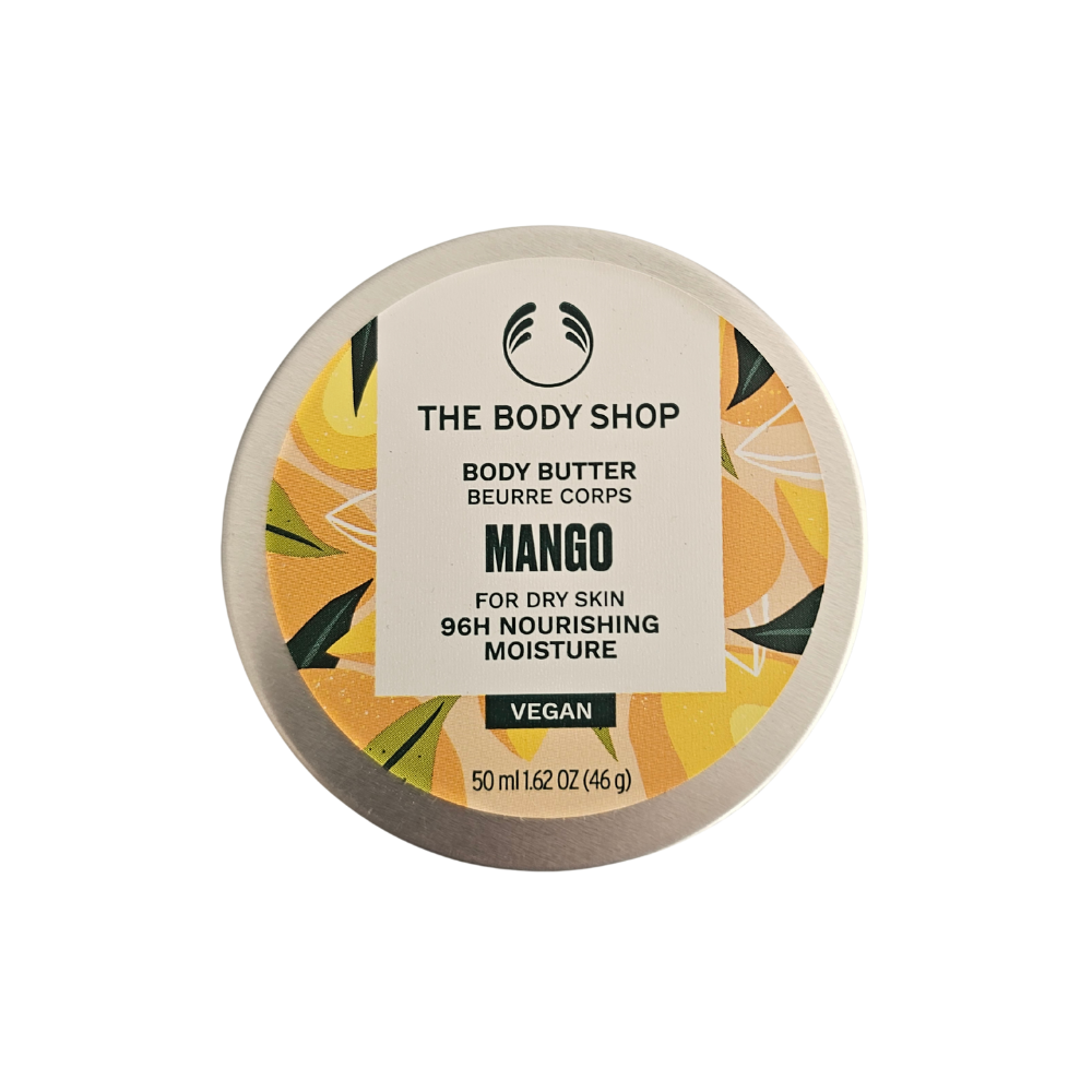 Mango body butter 50 ml tin, circular container with tropical label on top.