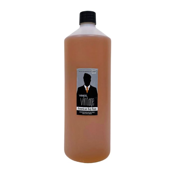 Bay rum bottle, 1 litre, black cap, amber liquid, branded label