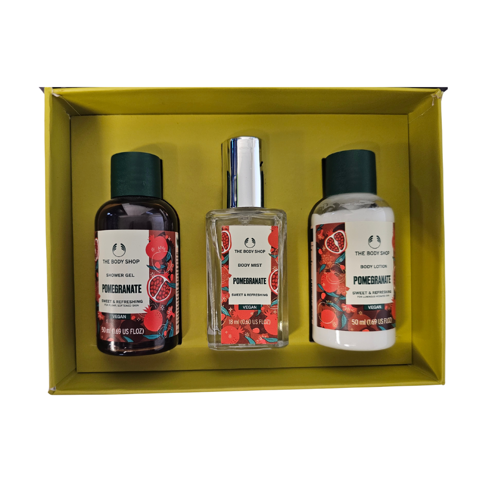 Pomegranate body care gift set: two bottles and a lotion jar in a box