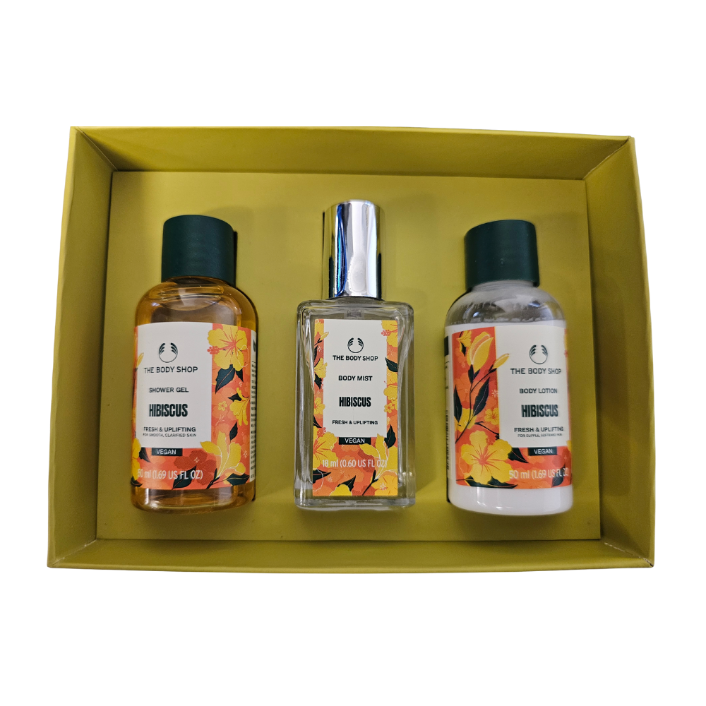 Hibiscus skincare set in box with three bottles: shower gel, body mist, and lotion