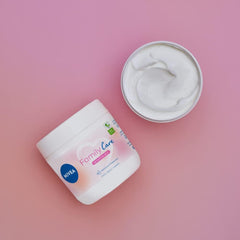 NIVEA Family Care cream jar with white cream in open lid