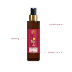 Forest Essentials body mist bottle, side view with red label and gold spray pump