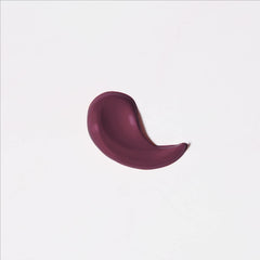 Liquid lipstick swatch, dark berry purple-mauve swirl