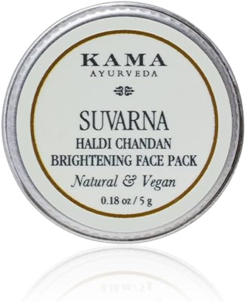 Kama Ayurveda face pack jar lid with Suvarna Haldi Chandan label, cream round sticker.